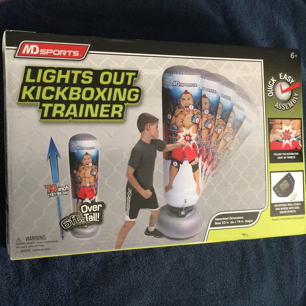 Kids Lights Out Kickboxing Trainer